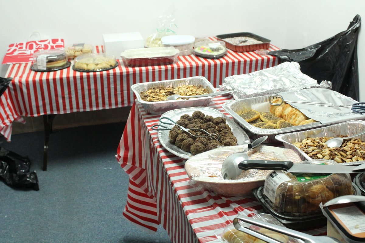 A long table of home-cooked dishes shared by neighbours at a Community Matters Mississauga potluck